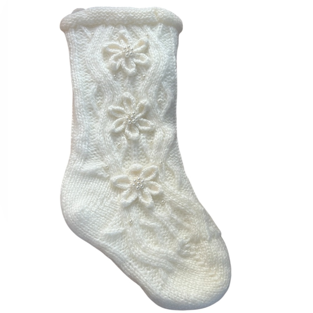 NWT White cable-knit Christmas stocking with pearl embellishments.